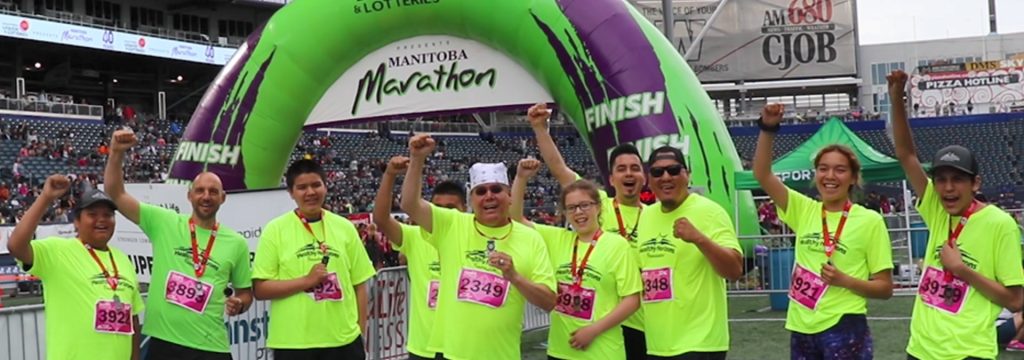 Healthy Horizon runners celebrating at the Manitoba Marathon