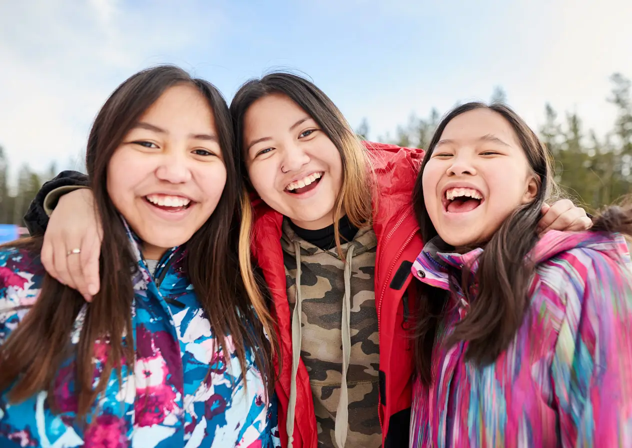 3 teenage girls smiling and having fun
