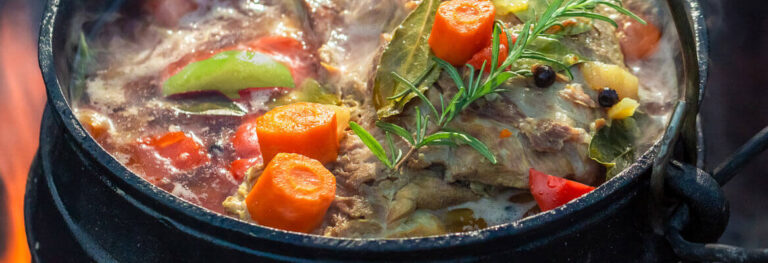 A nice hearty stew with carrots, Corned Beef, green peppers, onions and potatoes