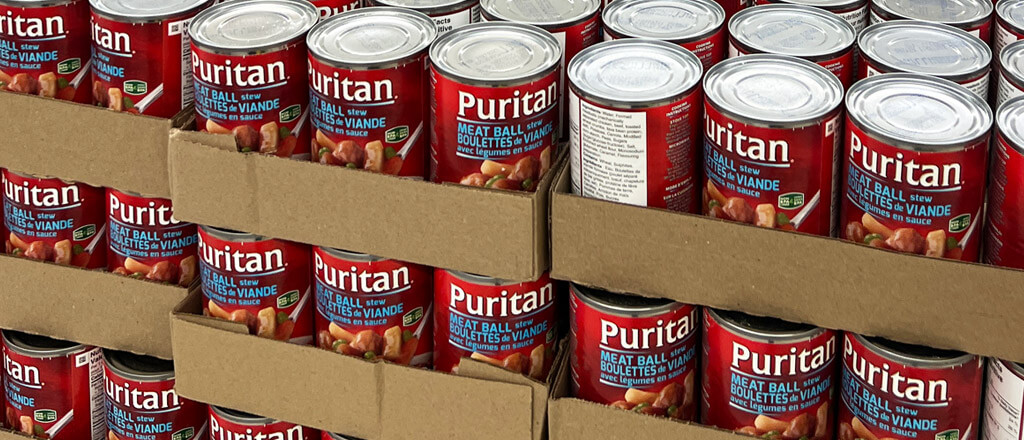 stacked cans of stews