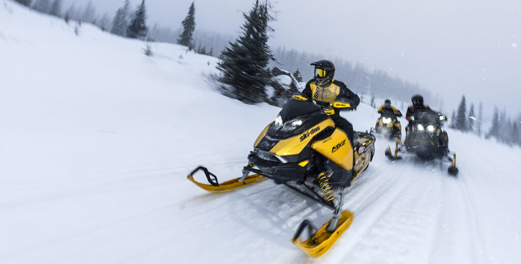 ski-doo crusing on nice fresh snow