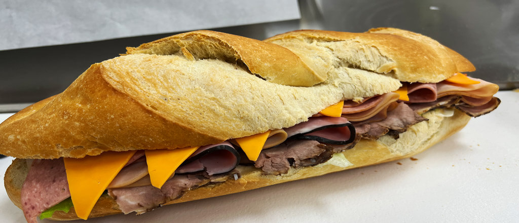 fresh large meat sandwich with cheese & meats